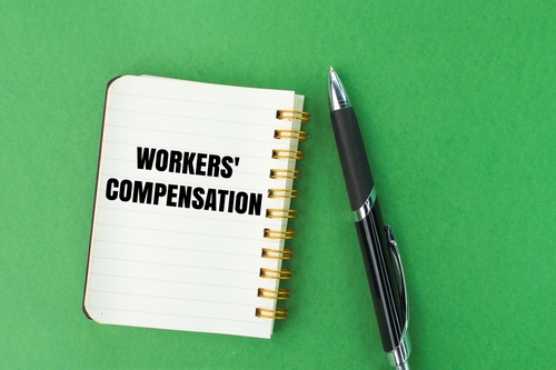 Pen,And,Notebook,With,The,Words,Workers',Compensation